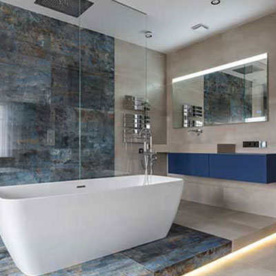 Modern bathroom renovation with freestanding tub and walk-in shower