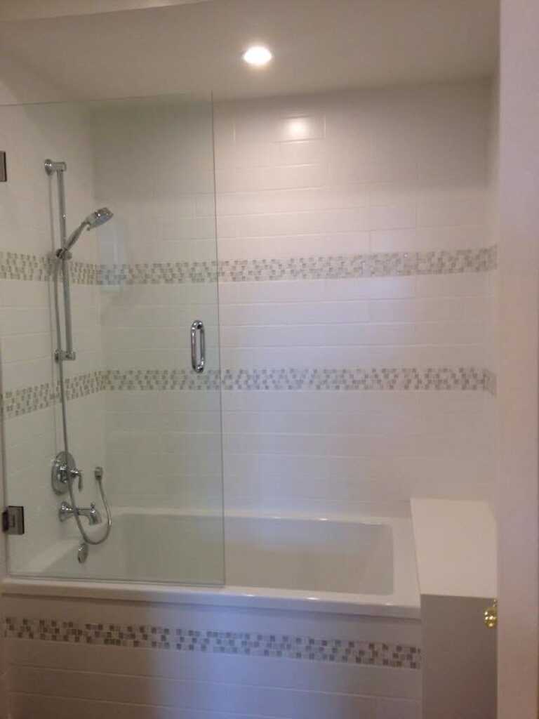Bathroom shower and tub renovation with updated plumbing fixtures